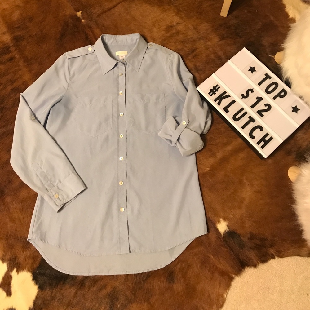 Chico’s size:0  Fits like a woman’s regular small.